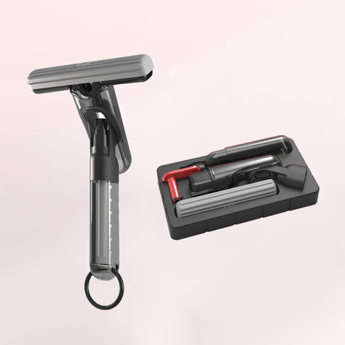 Gray cleaning tool with attachments on a light pink background